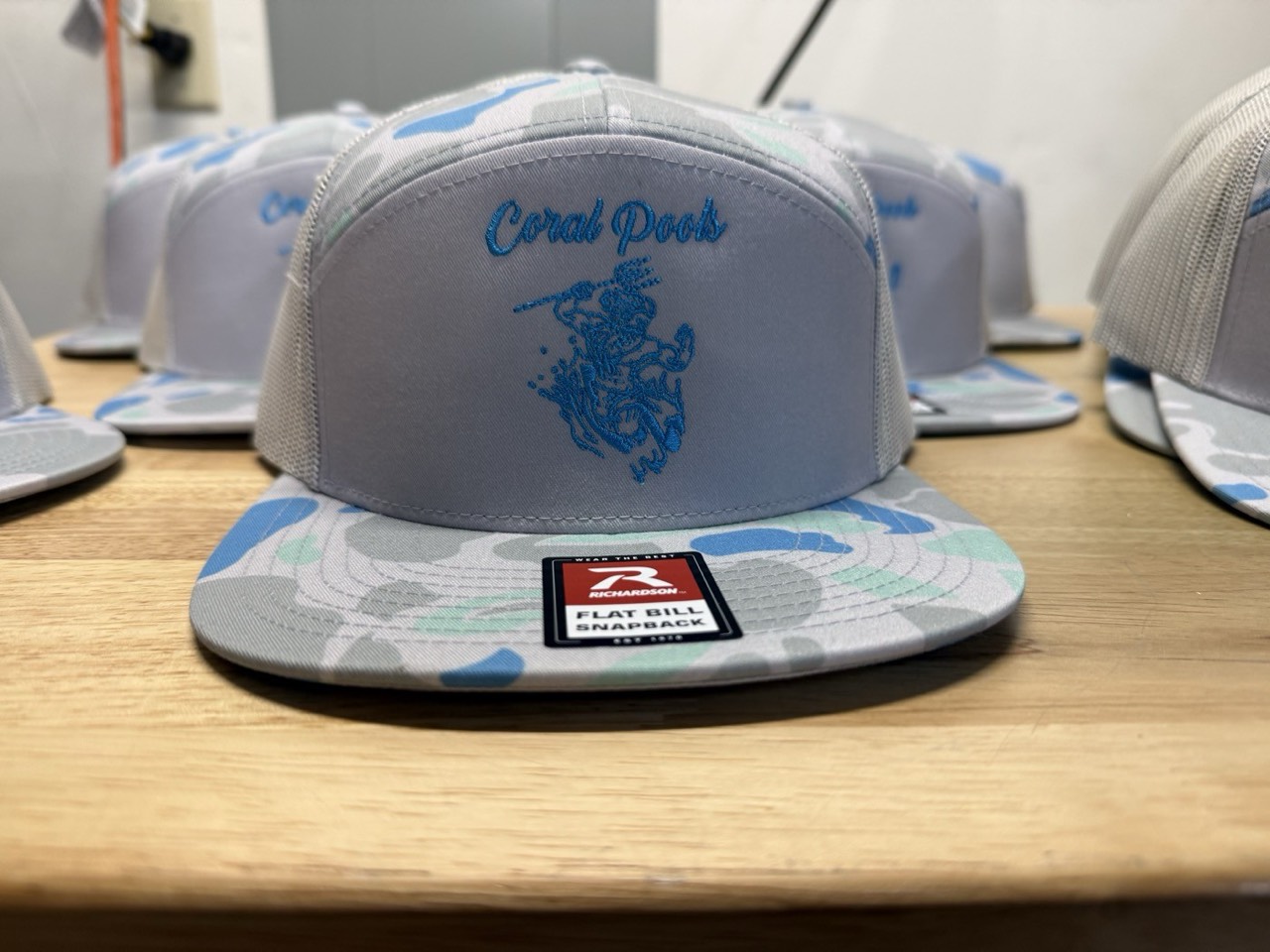 Embroidered camo cap by Meadow Prints & Embroidery, serving Manasquan, NJ