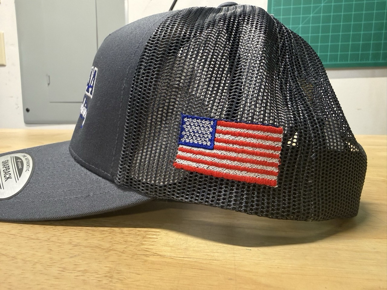 Flag-sleeve trucker by Meadow Prints & Embroidery, serving Sea Girt & Brielle, NJ