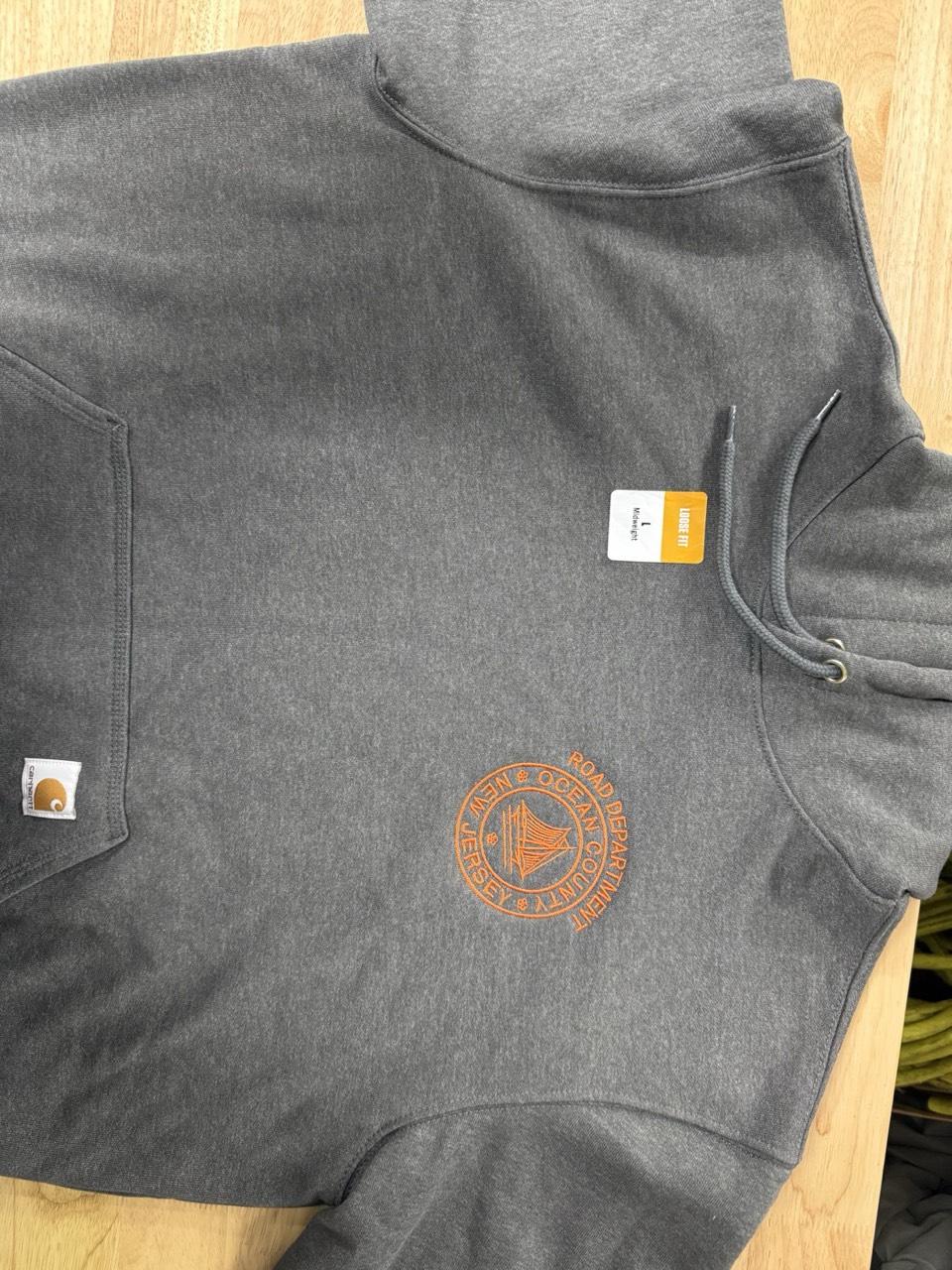 Left-chest logo tee by Meadow Prints & Embroidery, serving Neptune, NJ