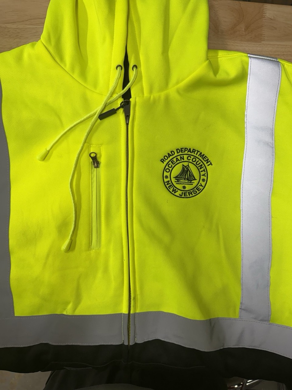 Hi-vis embroidered hoodie by Meadow Prints & Embroidery, serving Howell, NJ